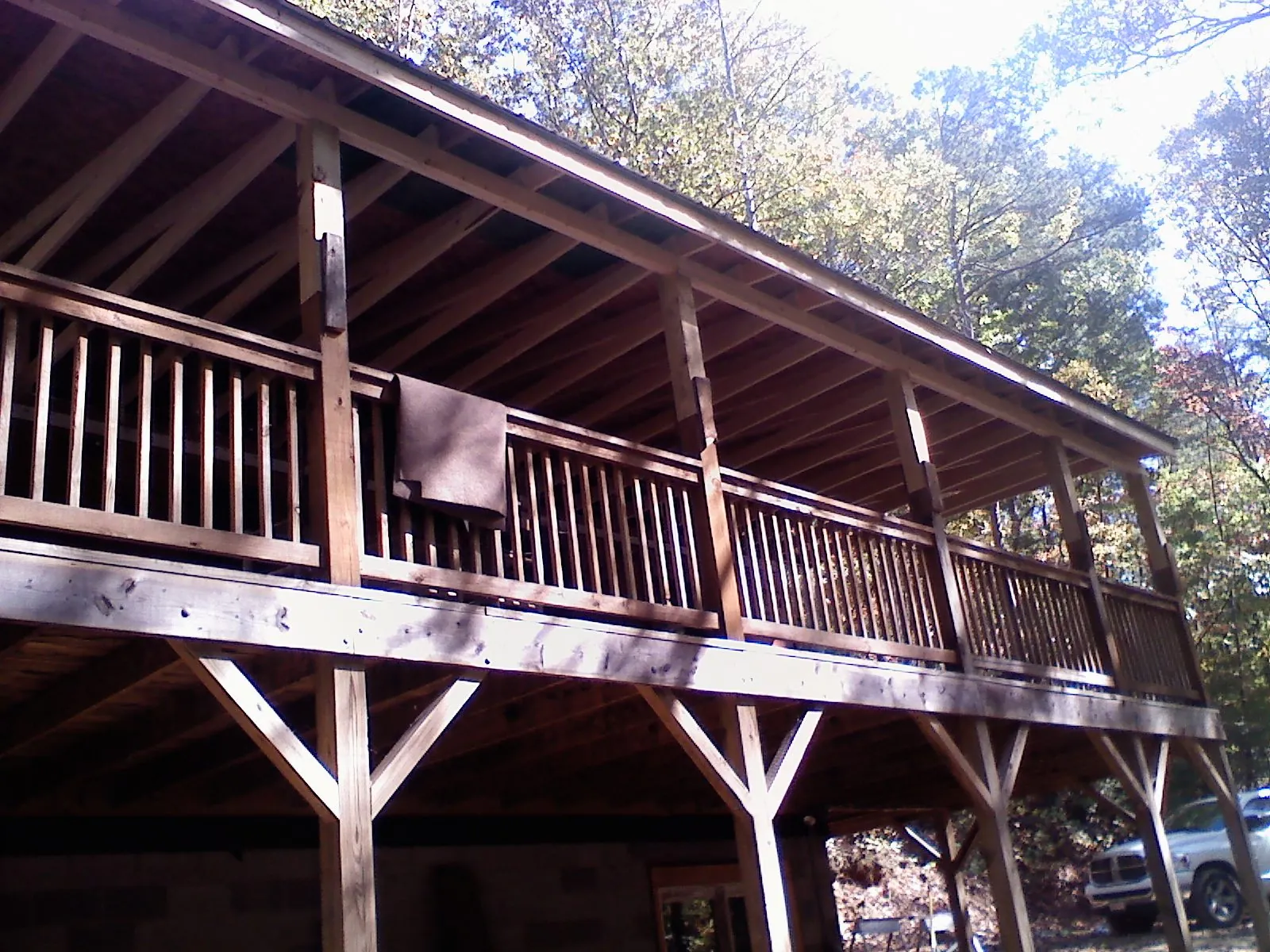 Timber framing under a new elevated porch and deck — Roof Leak Repair in West Plains by Roofing Brothers